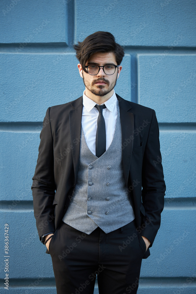 Handsome elegant businessman wearing a suit Handsome elegant businessman wearing a suit
