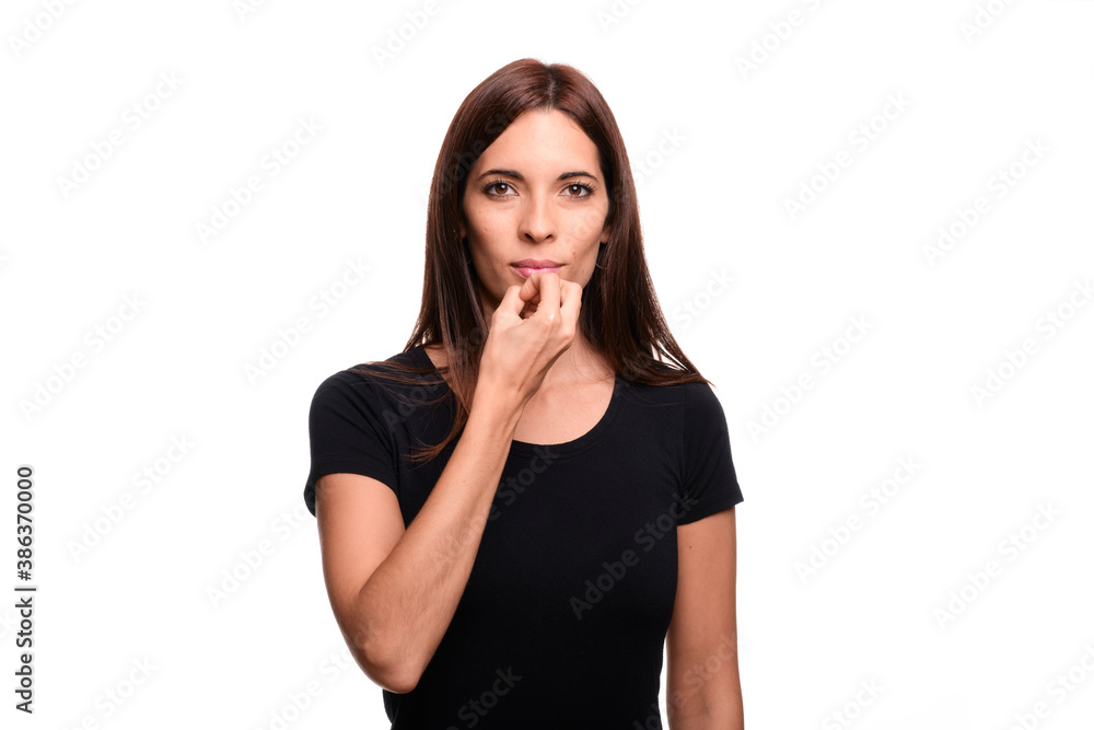 Isolated in white background brunette woman saying good in spanish sign language Isolated in white background brunette woman saying good in spanish sign language