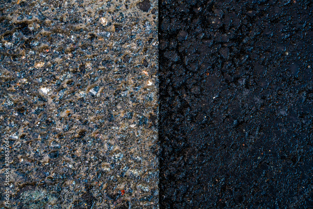 Junction point between old and new asphalt on a road. Junction point between old and new asphalt on a road.