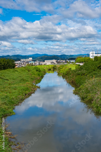 majestic blue sky and river rich in nature