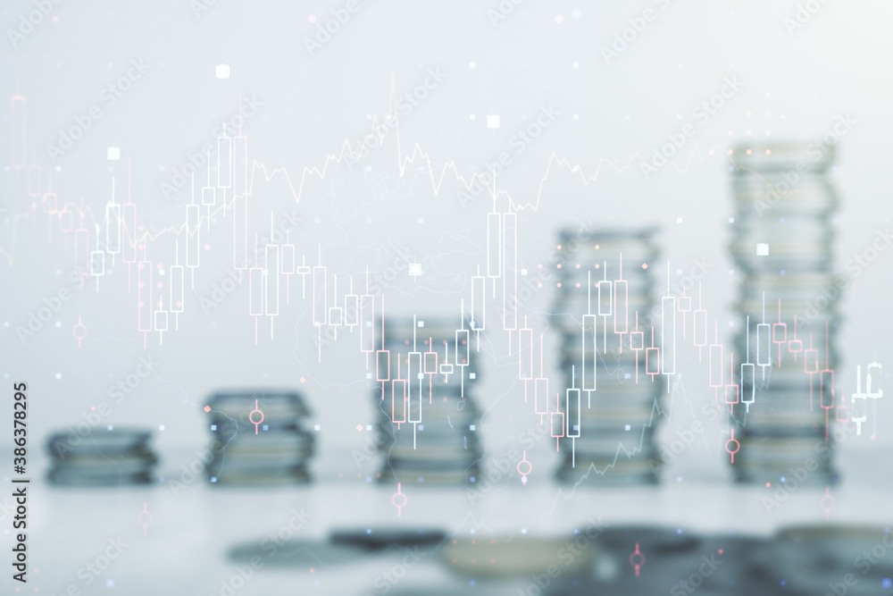 Abstract virtual financial graph hologram on stacks of coins background, forex and investment concept. Multiexposure Abstract virtual financial graph hologram on stacks of coins background, forex and investment concept. Multiexposure