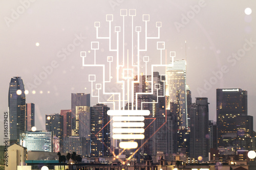 Virtual creative light bulb illustration with microcircuit on Los Angeles cityscape background, future technology concept. Multiexposure © Pixels Hunter