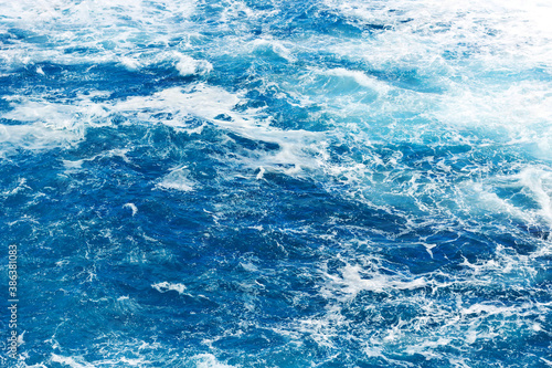 Ocean wave background. Bubble water foam backdrop. Turbulent sea texture. Messy water flow. © Paweł Michałowski