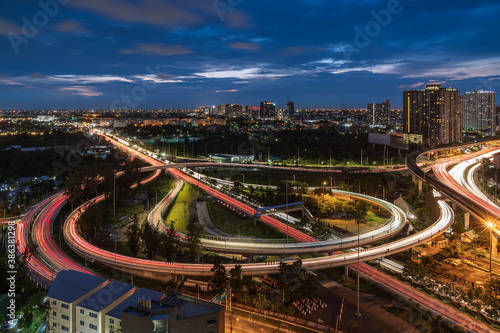 Elevated road junction interchange overpass expressway in Bangkok during twilight