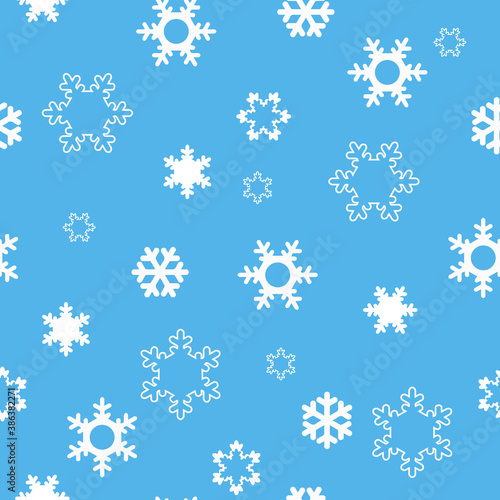 Snowflakes are white on a blue background. Different shape. Winter ornament. Festive pattern.