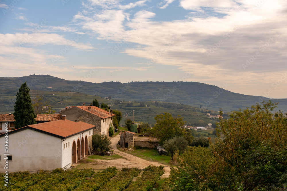 Beautiful view over the hills of the Veneto Region in Italy. It is one of the famous Italian Winemaking Region with small picturesque towns Beautiful view over the hills of the Veneto Region in Italy. It is one of the famous Italian Winemaking Region with small picturesque towns
