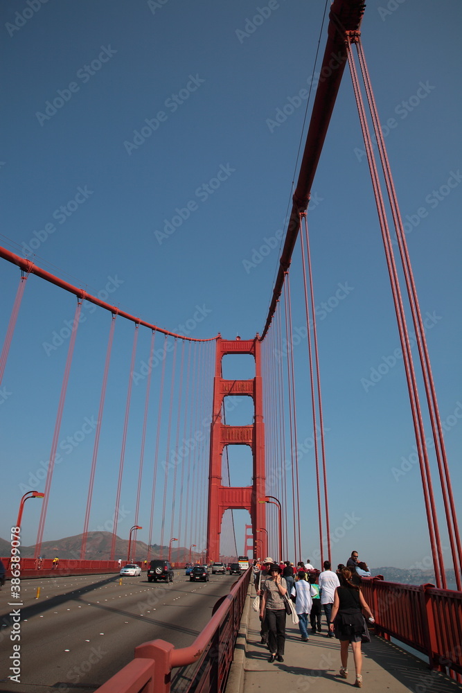 View of People and cars walking on Golden Gate bridge in San Francisco, USA View of People and cars walking on Golden Gate bridge in San Francisco, USA