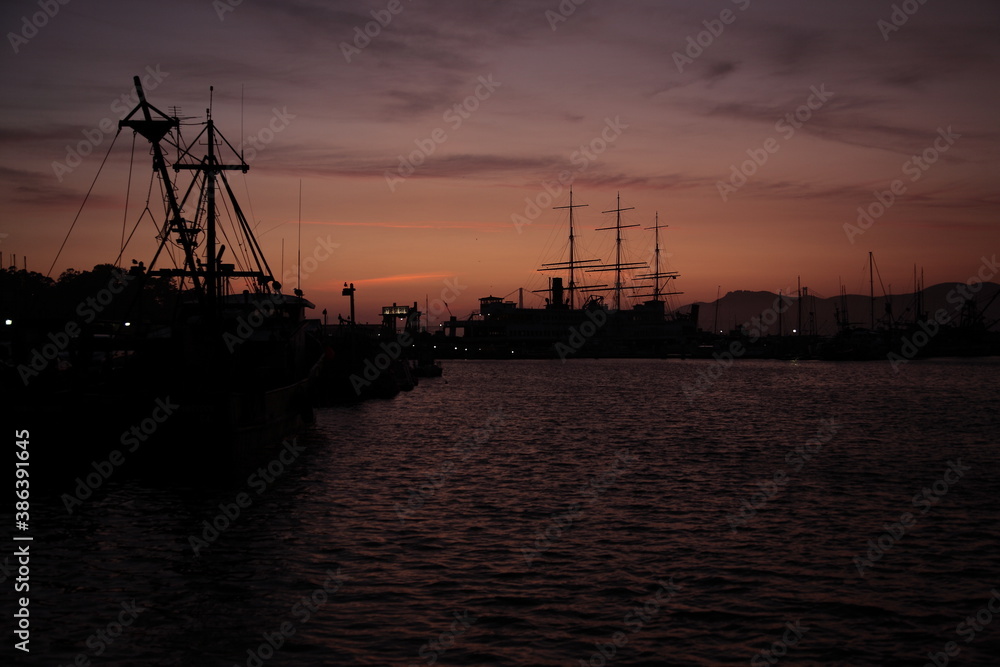 View of Fisherman's Wharf under sunset in San Francisco, California, USA. View of Fisherman's Wharf under sunset in San Francisco, California, USA.