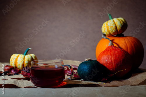 Bright pumpkins on the table on craft paper