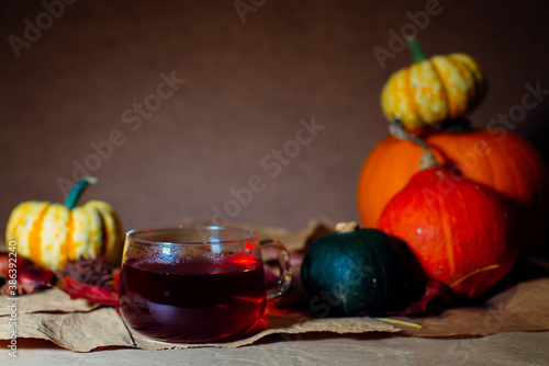 Bright pumpkins on the table on craft paper