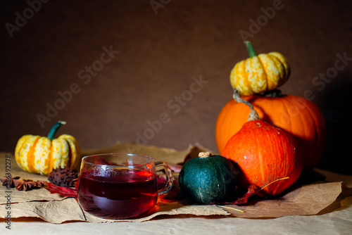 Bright pumpkins on the table on craft paper