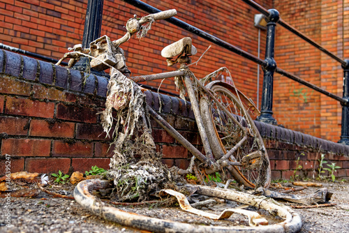 Rusty old bike taking out from a canal