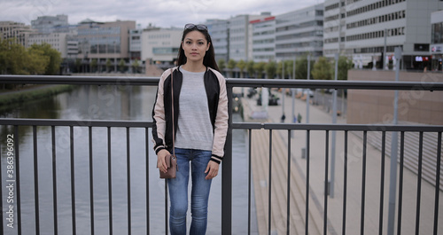 Young Asian woman in a city - people photography