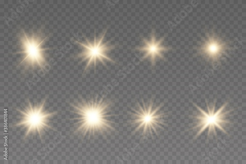 Shining star, the sun particles and sparks with a highlight effect, golden bokeh lights glitter and sequins. Light effect, golden glowing flash with gold rays and lights.