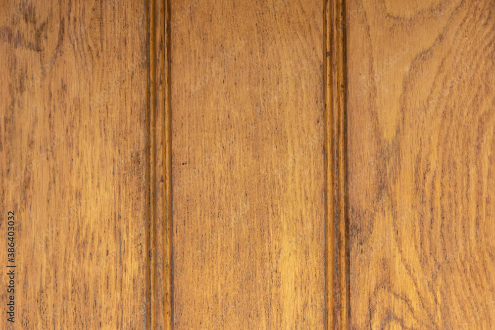 Obraz premium Texture of lacquered wood planks painted in brown.