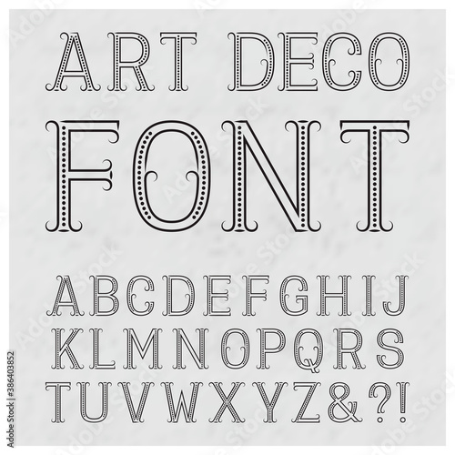 Font in art deco style. Vintage latin alphabet. Black capital letters of dots and lines with flourishes on a gray textured background.