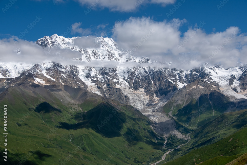 View from village Ushguli on Bezengi wall in Greater Caucasus with majestic snow-white peaks, Upper Svaneti, Caucasus