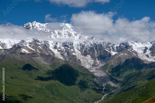 View from village Ushguli on Bezengi wall in Greater Caucasus with majestic snow-white peaks, Upper Svaneti, Caucasus