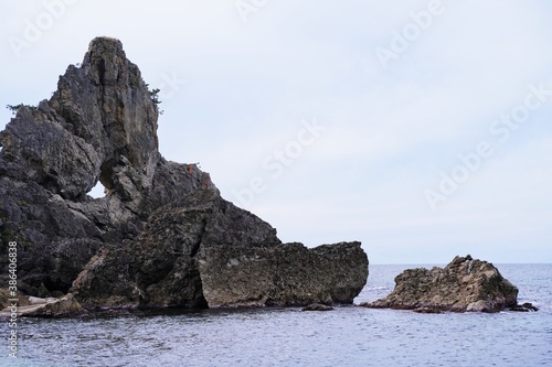 Rock with hole called "Window rock" at Noto peninsula, Ishikawa Japan.