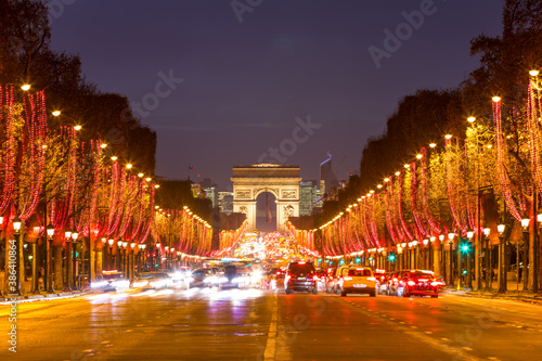 Arc de Triomphe and Champs Elysees in Paris at night © Wieslaw