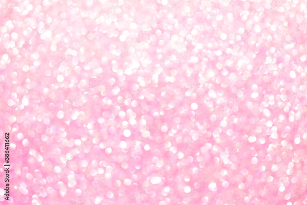 An abstract pink background with sparkle lights and bokeh. Pink blurred light. An abstract pink background with sparkle lights and bokeh. Pink blurred light.