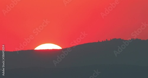 Sunset telephoto footage from long distance
