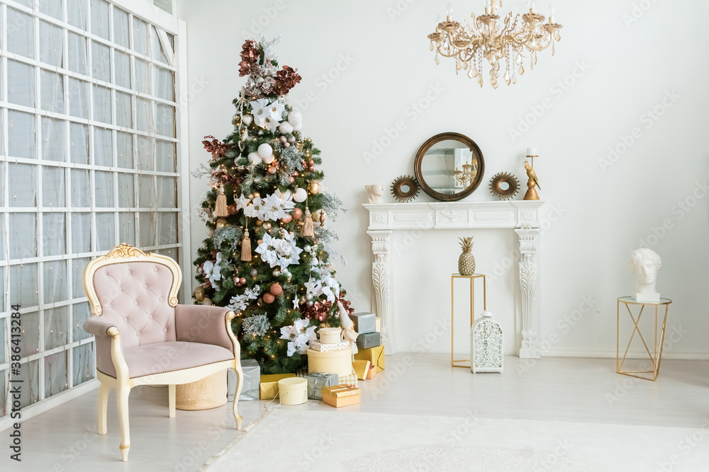 Stylish room interior with beautiful Christmas tree Stylish room interior with beautiful Christmas tree