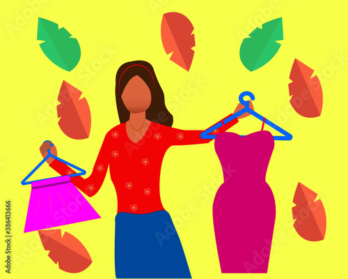 fashion blogger with dresses in hand