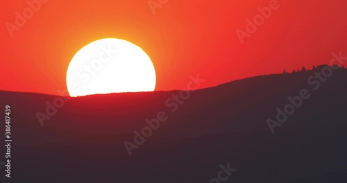 Sunset telephoto footage from long distance