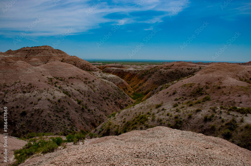 Rocks and sky with wispy clouds at Badlands