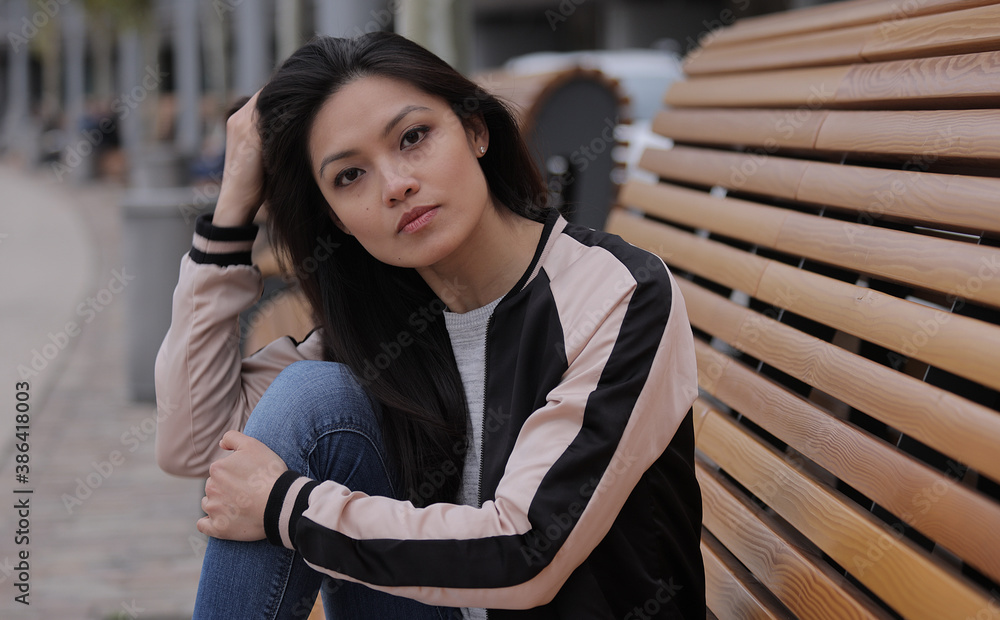 Young Asian woman in a city - people photography Young Asian woman in a city - people photography