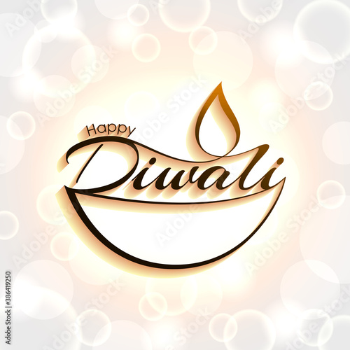 Happy Diwali greeting card with intricate calligraphy and illuminated Diwali lamp.