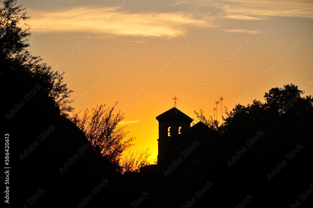 Churchtower of Saint Peter & Paul's parish (Parroquia de San Pedro y San Pablo), Granada at Sunset Churchtower of Saint Peter & Paul's parish (Parroquia de San Pedro y San Pablo), Granada at Sunset