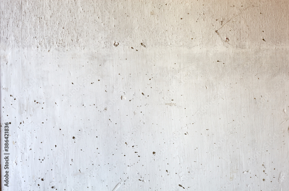 
Vintage brick wall with white plaster texture. Background of whitewashed wall indoors. Close-up of white stone wall 