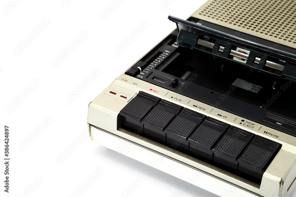 Obraz premium Old vintage portable cassette player from the 1980s isolated on a white background