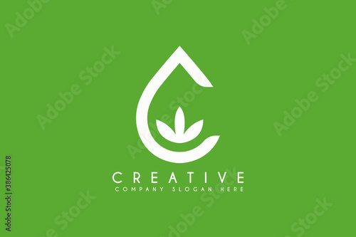 initial letter C with Cannabis leaf logo design vector illustration. Cannabis leaf with letter C logo. Usable for business health and care logos isolated on green background