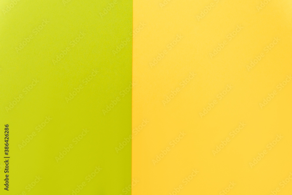 top view of colorful abstract yellow and green paper background