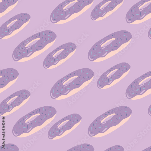 Stylized dessert seamless pattern with donuts silhouettes. Random food print in light pastel purple colors.