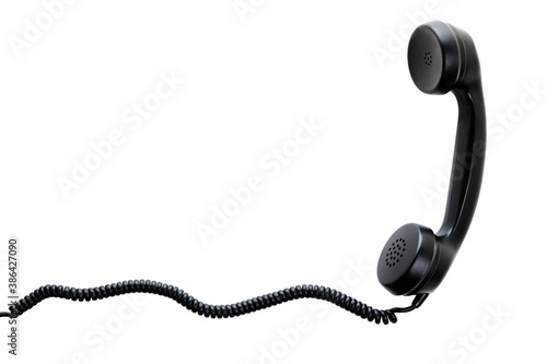 Photos Receiver with spiral cord of vintage telephone isolated  on white background
