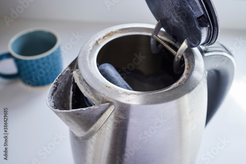 Close Up Of Electric Kettle With Limescale In Hard Water Area photo