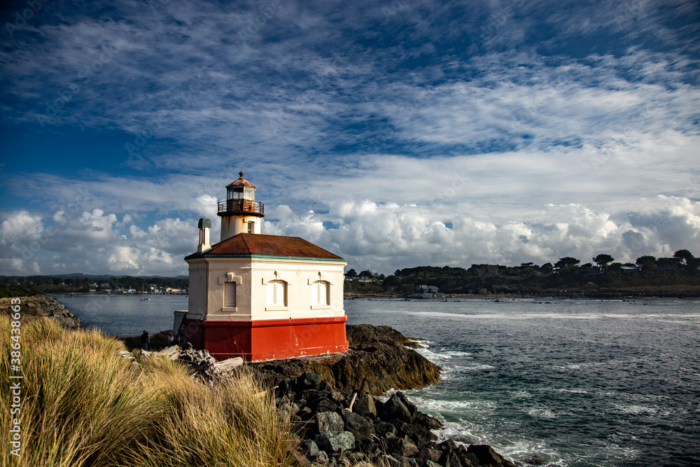 red and while lighthouse in a river red and while lighthouse in a river
