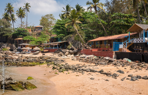Bungalows for tourists on the bay of the Indian ocean in Goa, India