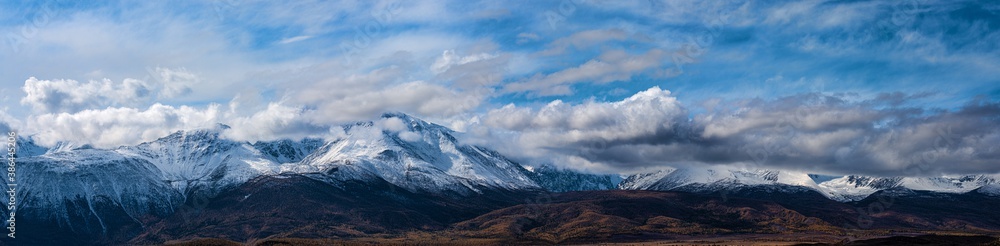 panoramic view of picturesque snowy mountains tops