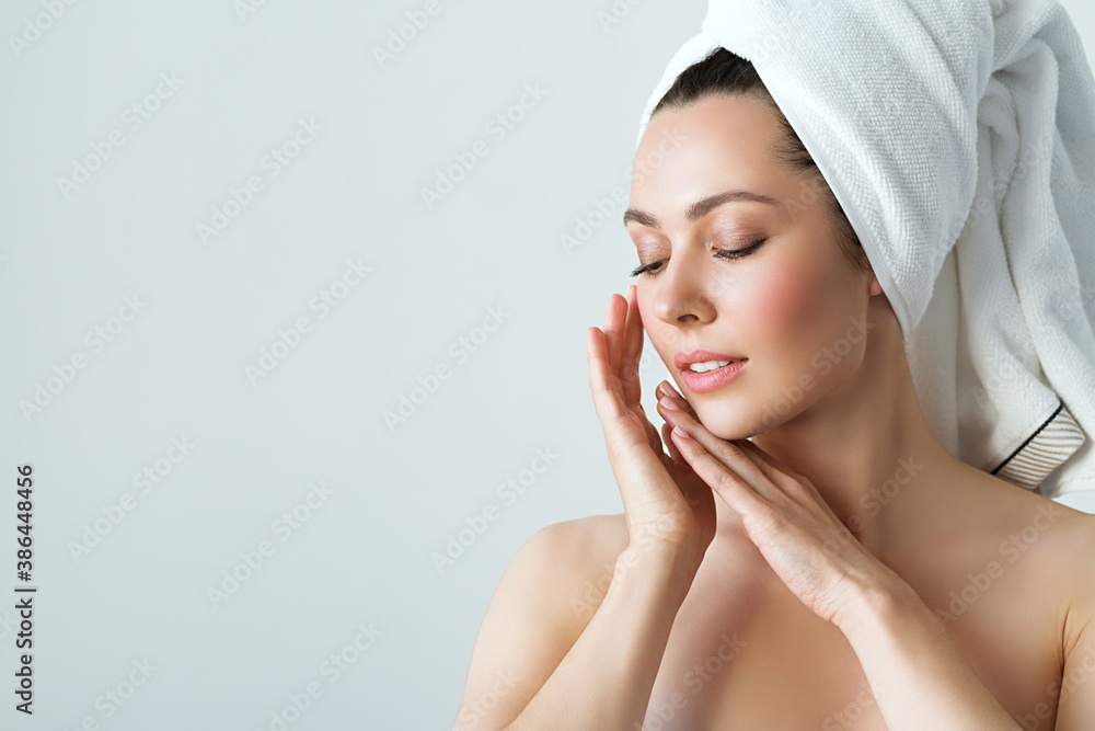 Young beautiful woman with perfect skin, touching her face. Cosmetology, beauty and spa concept. Young beautiful woman with perfect skin, touching her face. Cosmetology, beauty and spa concept.