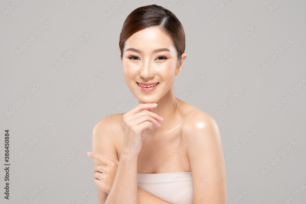 Beautiful Young Asian Woman Looking While Touching Chin feeling so happy and cheerful with healthy Clean and Fresh skin on white ,Plastic Surgery chin,Beauty Cosmetics and spa facial treatment Concept