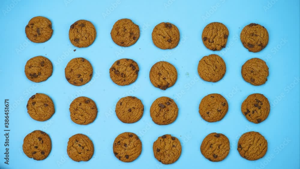 stop motion cookies dancing on blue background stop motion cookies dancing on blue background