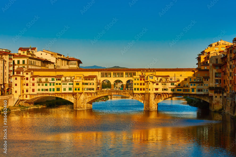 Florence Arno river and Ponte Vecchio landmark of Tuscany Italy