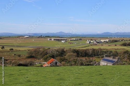 A clear, sunny view across the old airfield at Llanbedr, Wales, towards the Llyn Peninsula. photo