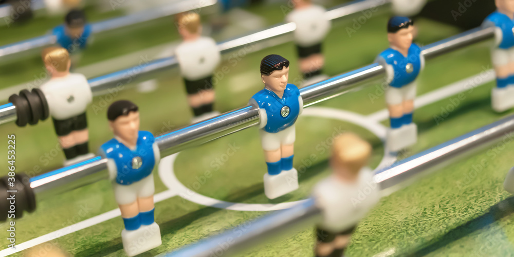 Fototapeta premium foosball tablepot court with plastic players for leisure in office