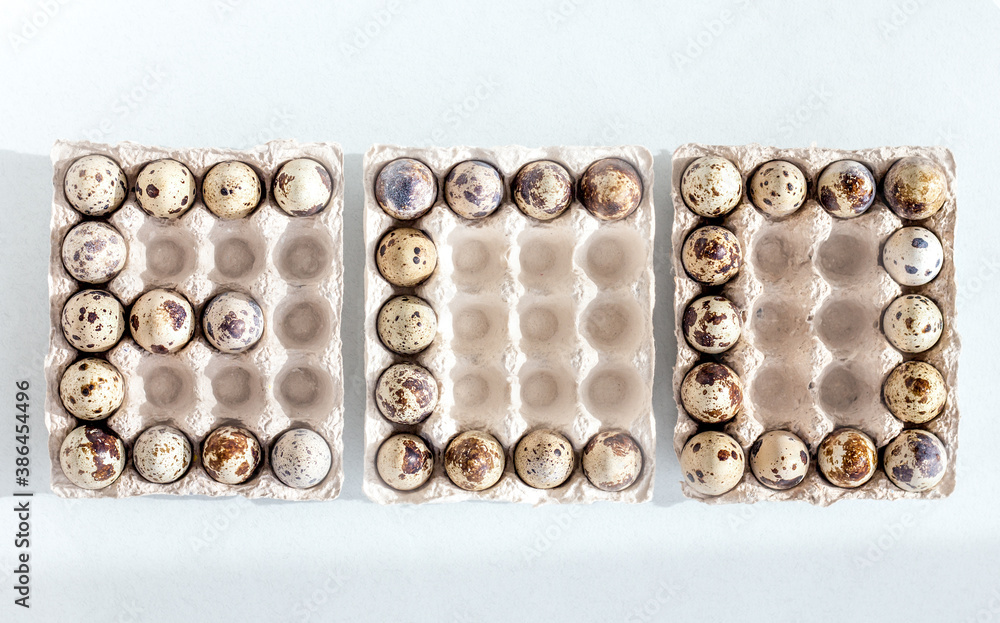 top view of word eco made of quail eggs in carton containers, eco friendly package, zero waste concept, flat lay of e c o letters top view of word eco made of quail eggs in carton containers, eco friendly package, zero waste concept, flat lay of e c o letters
